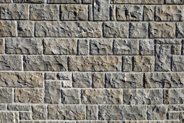 Stone Cladding Installation in Brick