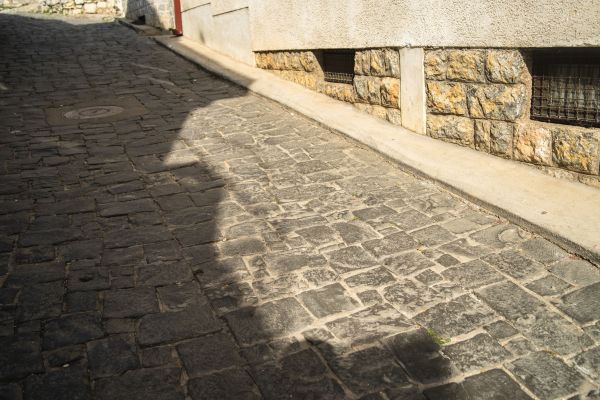 Stone Sidewalk Repair in Brick